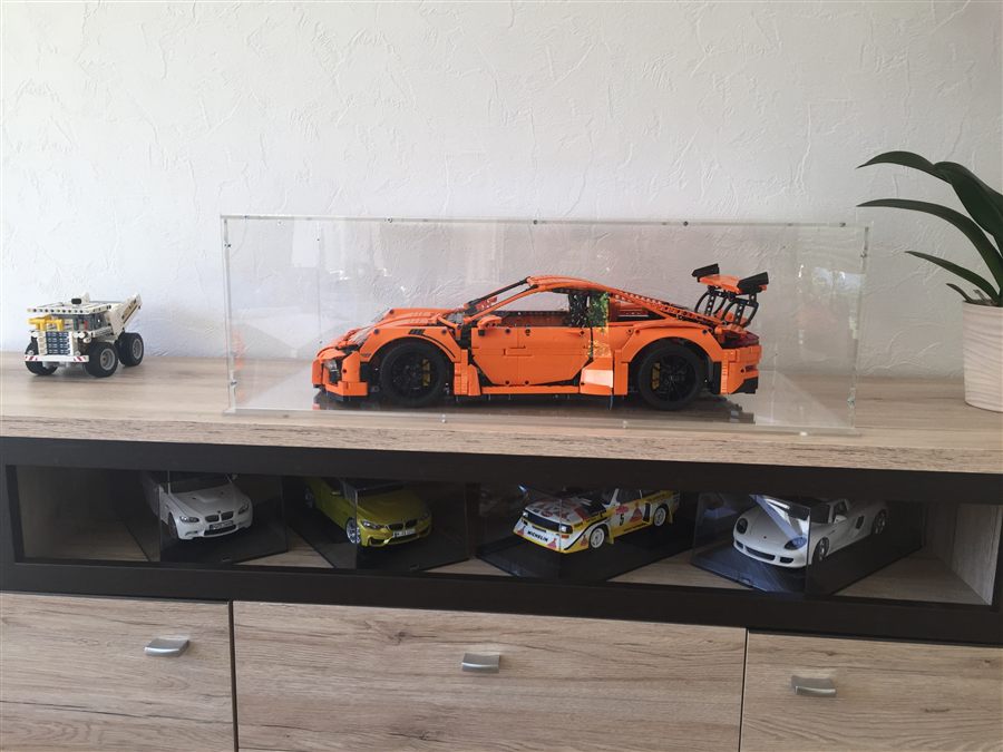 Real customer photo: LEGO Technic sports car under a Sora made-to-measure display case on a sideboard