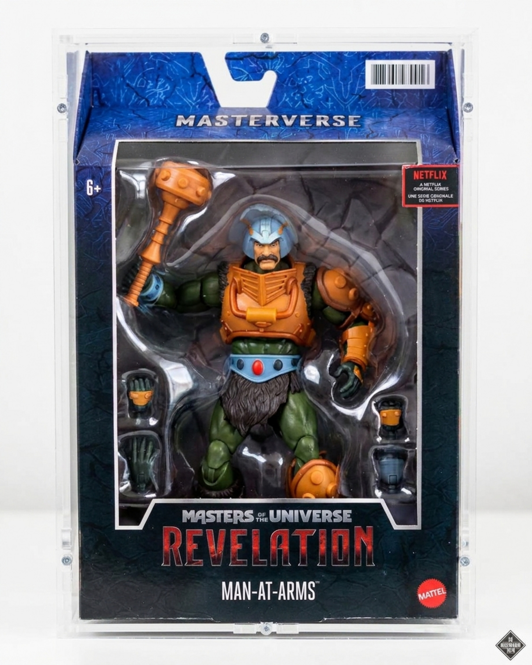 Masterverse Man-At-Arms action figure in its original packaging under a Sora acrylic case